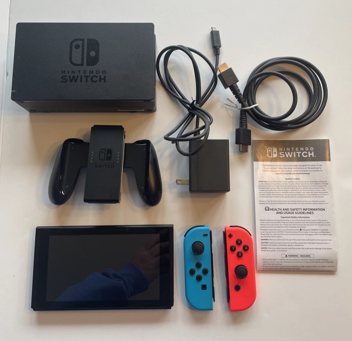 Nintendo Switch v2- 32GB HAC-001 Console with Dock, Charger, Red/Blue Joy-Cons thumbnail 1