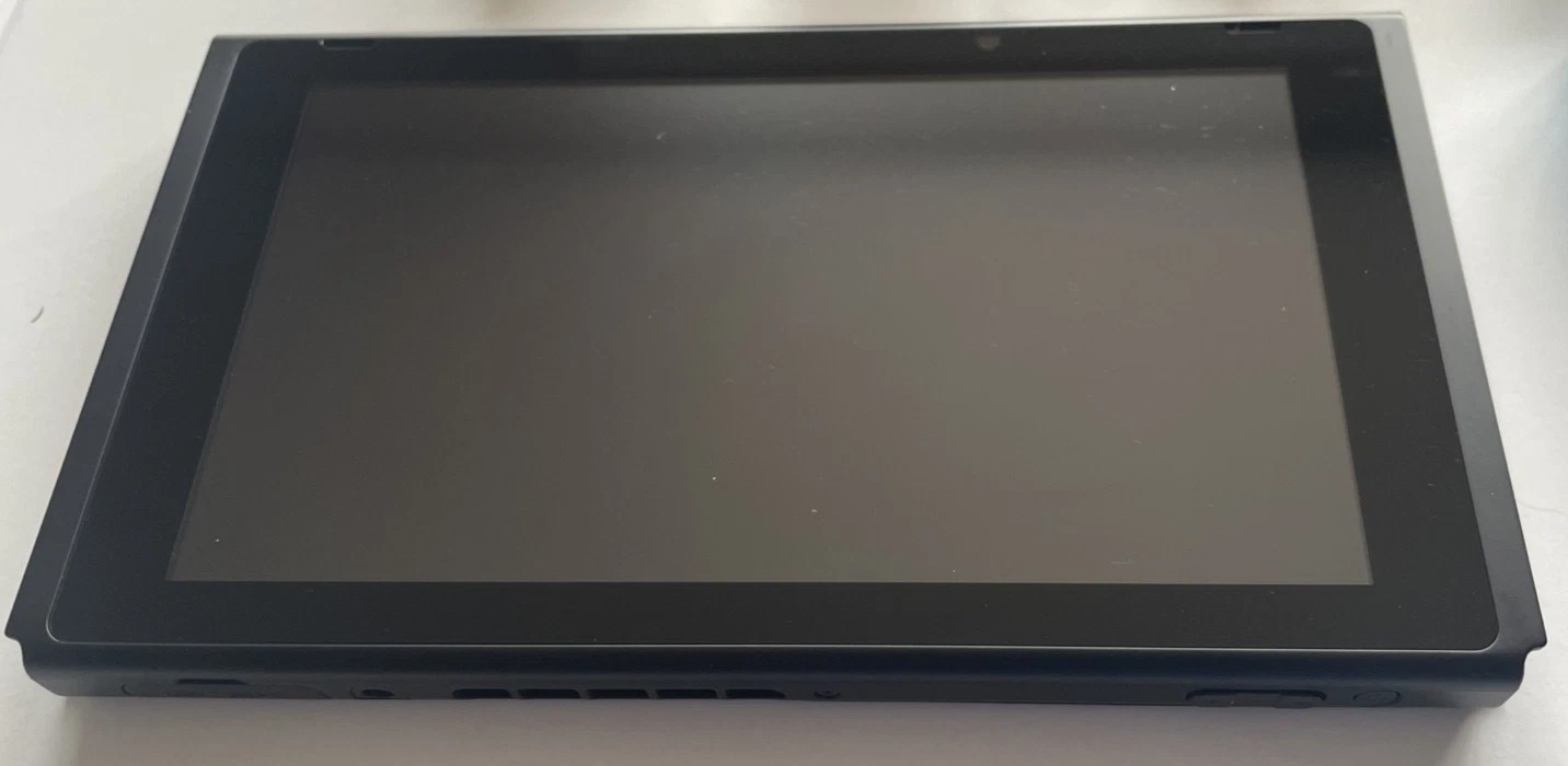 Nintendo Switch v2- 32GB HAC-001 Console with Dock, Charger, Red/Blue Joy-Cons thumbnail 3